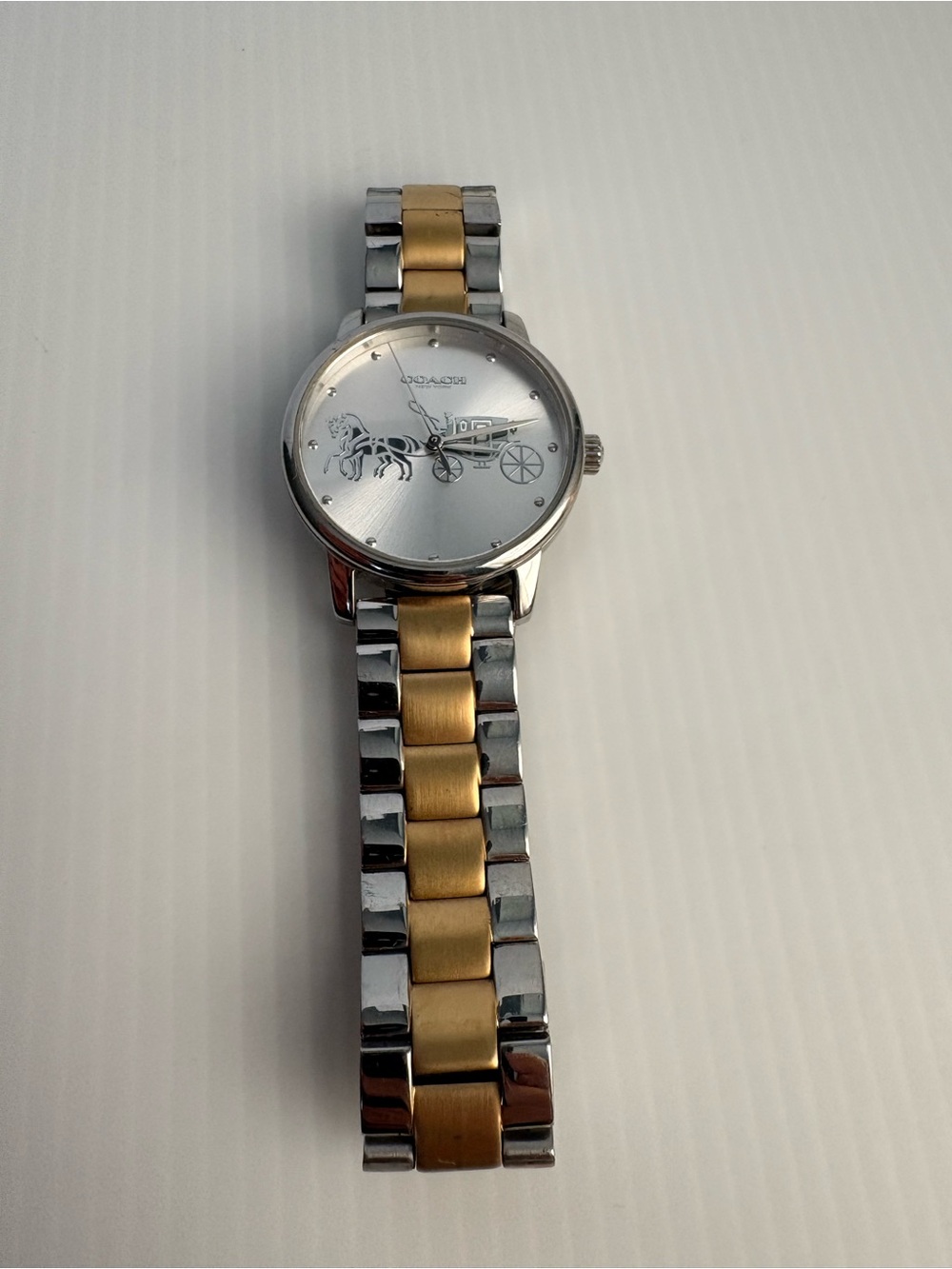 Coach Two-Tone Silver and Gold Horse & Carriage Bracelet Watch